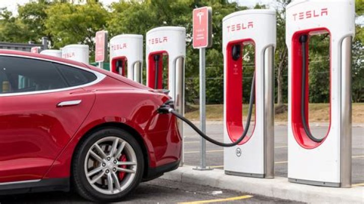 Why Do You Tap a Tesla Charger Port? It’s a Simple Answer, Actually